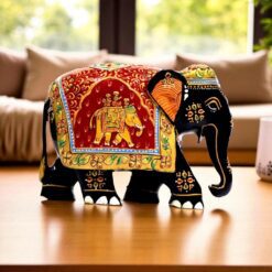 Colorful handcrafted decorative elephant figurine with intricate patterns,