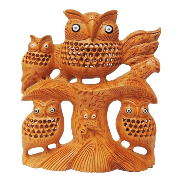 Wooden owl sculpture with three baby owl siting on wood tree jail and inlay work on it.