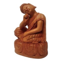 Wooden Carved Buddha figurines within resting pose