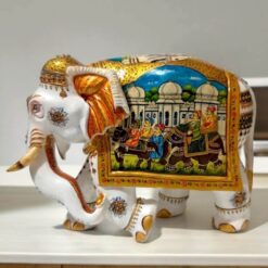 handmade kadam wood elephant figurine with Rajasthani miniature painting on it