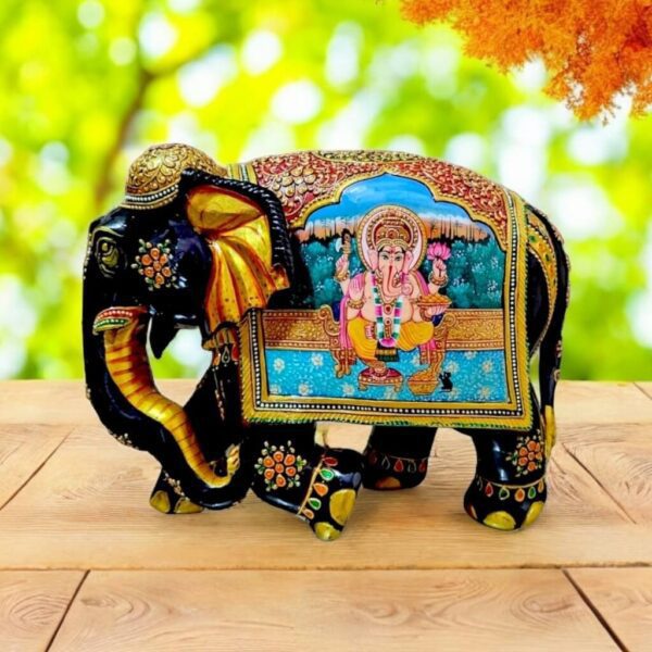 Wooden elephant statue with lord Ganesha figurines painted on elephant