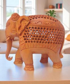 elephant figurine with intricate carvings, cultural motifs, and natural earthy tones.