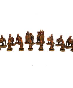 Intricately carved Indian-inspired painted chess set with gold accents and ornate cultural designs.
