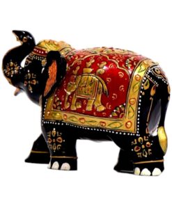 wooden elephant statue trunk up painted