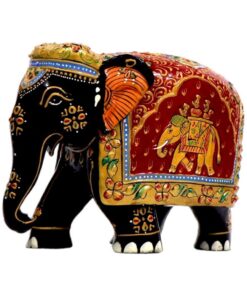 Decorative Indian elephant figurine with black body, colorful patterns, and ornate saddle.