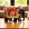 Colorful handcrafted decorative elephant figurine with intricate patterns,