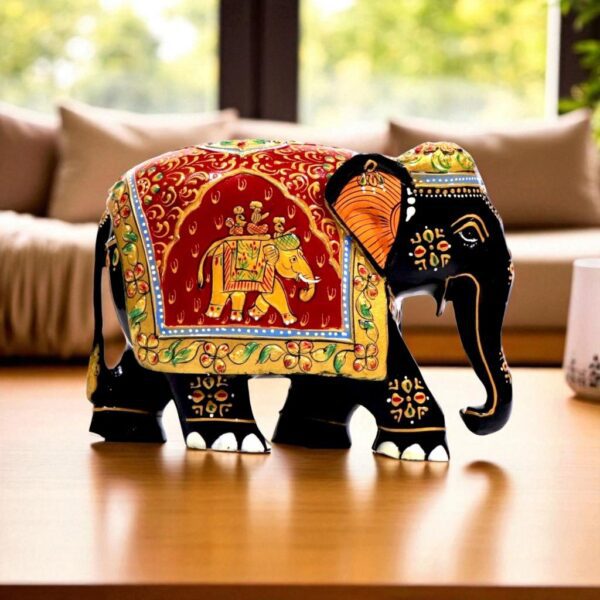 Colorful handcrafted decorative elephant figurine with intricate patterns,