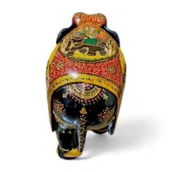 Decorative elephant sculpture with intricate Indian-inspired patterns and vibrant colors.