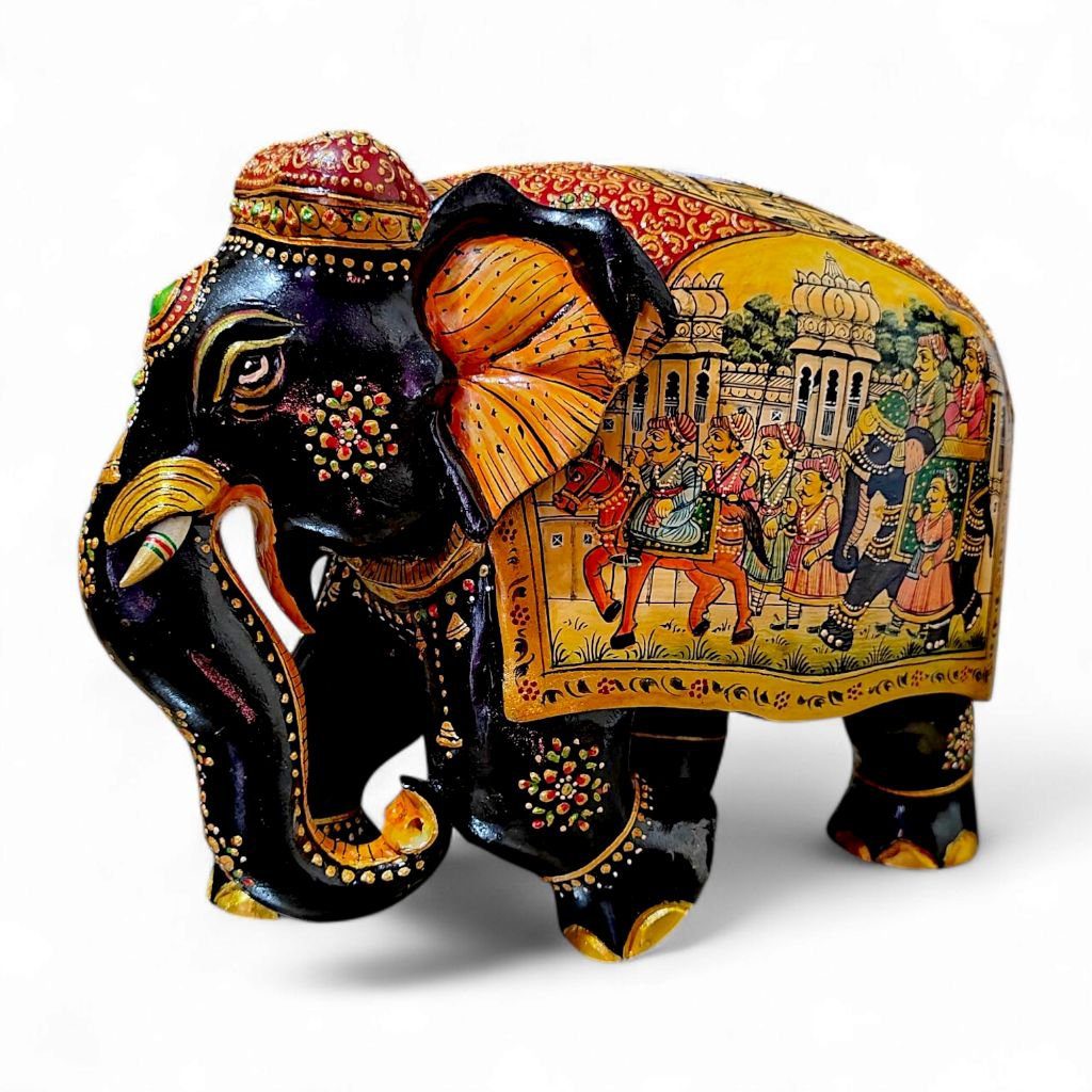 Decorative Indian-style black elephant sculpture with colorful murals, gold accents, jewels, and intricate craftsmanship.