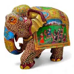 wood embossed painted elephant with round trunk with design painted.