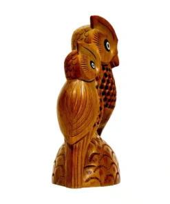 Wooden owl sitting on a stand hand carved design on both owl