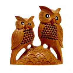 Wooden owl pair with undercut jail caving inlay black and white design on eye