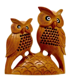 Wooden owl pair with undercut jail caving inlay black and white design on eye