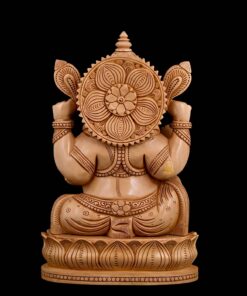 Intricately carved wooden Ganesha statue back view with lotus pedestal and halo.