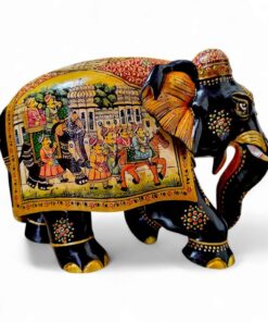 Colorful decorative elephant sculpture with intricate, traditional artwork, regal scene, and vibrant patterns.