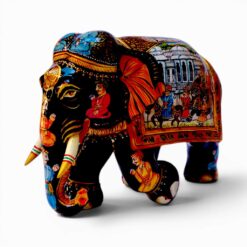 Hand painted wooden elephant figurine with colorful Indian palace artwork.