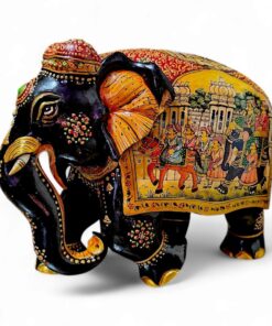 Decorative Indian-style black elephant sculpture with colorful murals, gold accents, jewels, and intricate craftsmanship.
