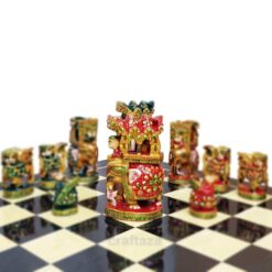 Colorful cultural artistic chess set with ornate pieces and traditional design.