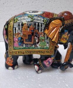 Colorful Indian hand-painted elephant figurine showcasing traditional craftsmanship and cultural storytelling art.