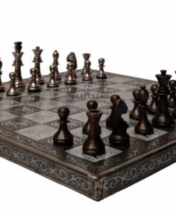 Elegant bronze chess set on ornate board, perfect for art, decor, and strategic gameplay.