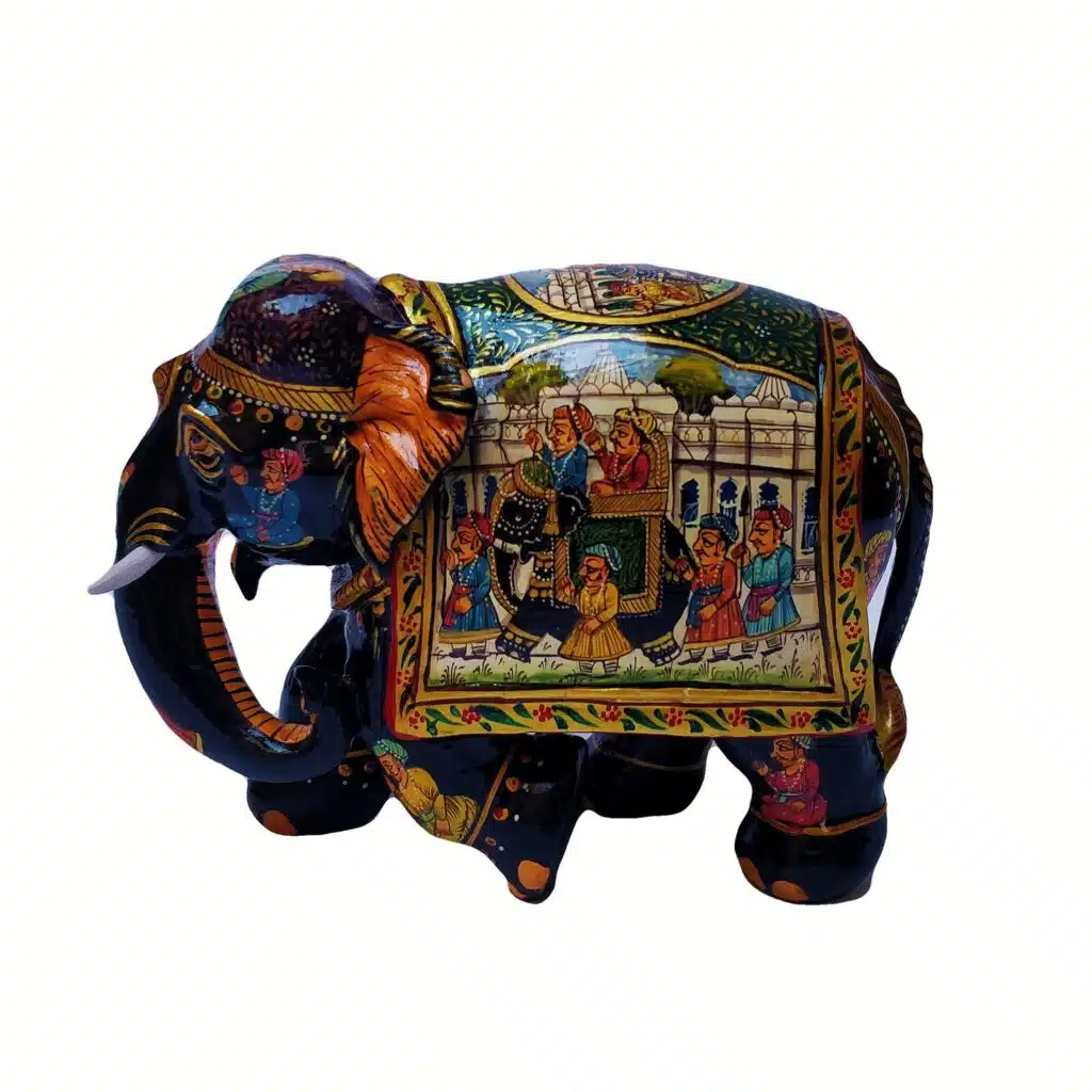 Indian ceremonial elephant figurine with intricate colorful artwork and cultural motifs.