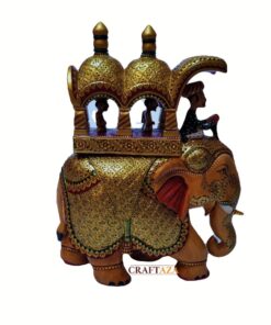 Decorative golden elephant figurine with ornate howdah and vibrant red ears for Asian-inspired decor.