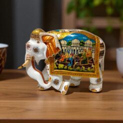 Wooden white color body and miniature painting on it horse and elephant man seting on it