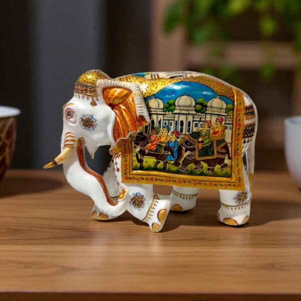 Wooden white color body and miniature painting on it horse and elephant man seting on it