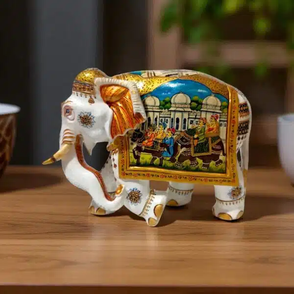 Wooden white color body and miniature painting on it horse and elephant man seting on it