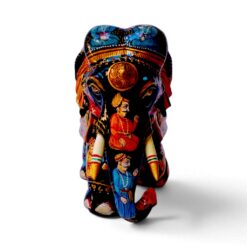 Hand painted wooden elephant figurines featuring colorful Indian folk art details.