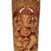 Intricately carved Lord Ganesha statue with multiple arms, floral motifs, and symbolic offerings.