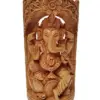 Intricately carved Lord Ganesha statue with multiple arms, floral motifs, and symbolic offerings.