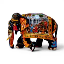 Hand painted wooden elephant figurines featuring ornate Indian royal procession artwork.