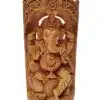 Intricately carved Lord Ganesha statue with multiple arms, floral motifs, and symbolic offerings.