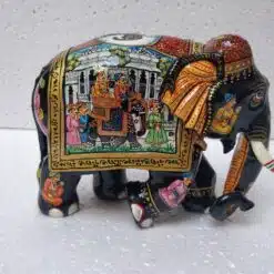 Colorful Indian hand-painted elephant figurine showcasing traditional craftsmanship and cultural storytelling art.