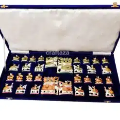 handcrafted chess set in deep blue velvet case with intricate, culturally themed pieces.