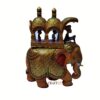 Decorative golden elephant figurine with ornate howdah and vibrant red ears for Asian-inspired decor.