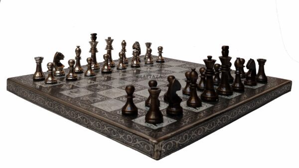 Elegant bronze chess set on ornate board, perfect for art, decor, and strategic gameplay.