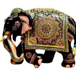 Colorful decorative elephant sculpture with intricate Indian patterns and cultural symbolism.