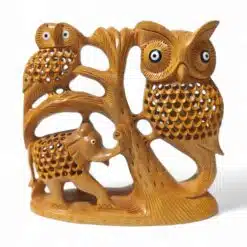 Crafted wooden sculpture of owls and elephant, showcasing detailed wildlife art and handcrafted design.