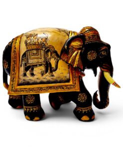 Ornate carved wooden elephant figurine with colorful Indian ceremonial painted details.