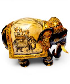 Carved wooden elephant figurine with colorful Indian royal procession painting.