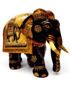 Carved wooden elephant figurine with ornate gold and red Indian-style painted details.