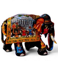 Hand painted wooden elephant figurines with colorful Indian palace artwork.