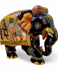Decorative Indian-style black elephant figurine with detailed paintings, gemstones, floral motifs, and cultural symbolism.