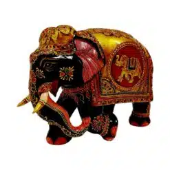 vintage wood painted elephant statue a small trunk up elephant made on it