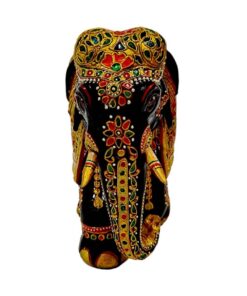 wood elephant trunk painted with golden, red , green color