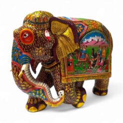 wooden trunk down elephant with painting art on elephant trunk.