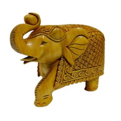 Wooden carved elephant statue trunk up with ball in trunk