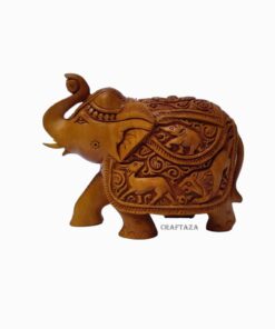 Hand-carved wooden elephant sculpture with intricate tribal patterns and cultural artistry.